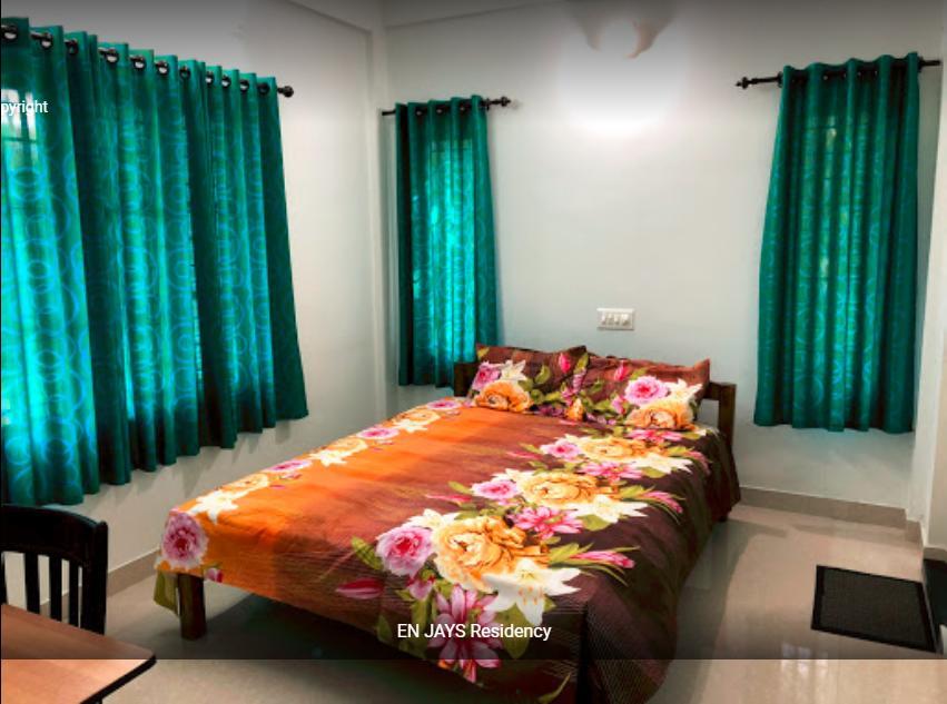 En Jays Residency Apartment กัตตะยัม ภายนอก รูปภาพ